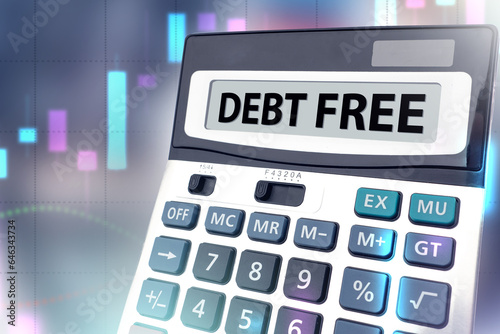 Debt free. Accounting calculator. Financial independence concept. Debt free background. Calculator next to economic charts. Exemption from debts and taxes. Getting rid of loans and mortgages