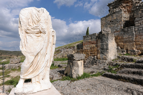 Headless statue wearing a toga, Roman ruins of Segobriga, Spain