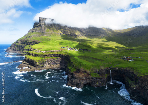 Faroe island landscape - waterfall from drone, Denmark