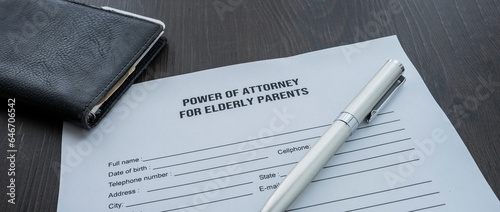 A power of attorney for elderly parents form on the desk