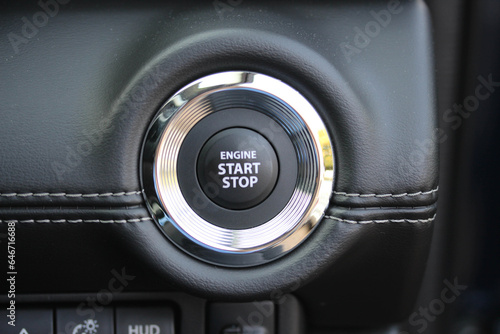 Close up of an engine start stop button