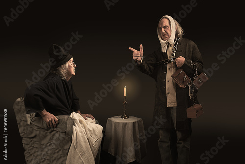 Ebenezer Scrooge having a discussion with the ghost of Jacob Marley, his deceased business partner