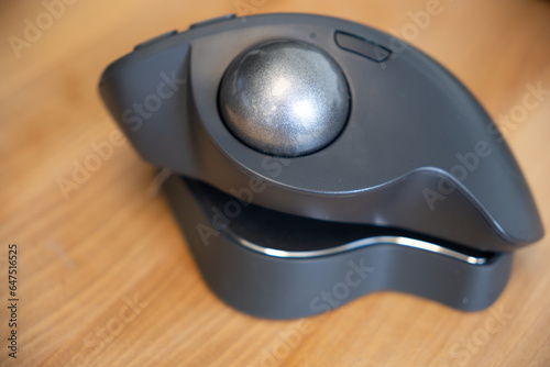 Computer Trackball mouse on office desk at work