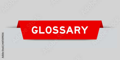 Red color inserted label with word glossary on gray background