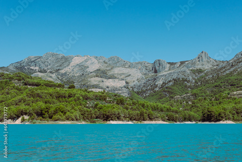 Mountain landscape, picturesque mountain lake on a summer morning, large panorama, Spain, Guadalest