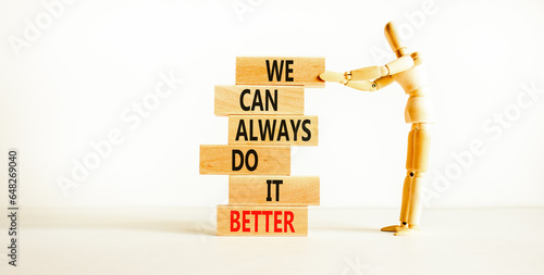 We make it better symbol. Concept words We can always do it better on wooden block. Beautiful white table white background. Businessman icon. Business we make it better concept. Copy space.