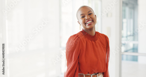 Smile, confident and business black woman in a company happy for startup development or growth at work. Designer, laughing and portrait of young employee or African entrepreneur proud in office