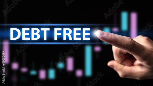 Debt free. Finger near virtual screen. Exemption from loans concept. Neon inscription debt free. Metaphor for fight against economic slavery. Getting rid of financial problems. Debt free background