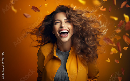 Autumn background with a laughing model.