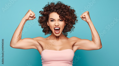 Strong young lady grabs attention as she shows off her muscular biceps and vocalizes her strength..