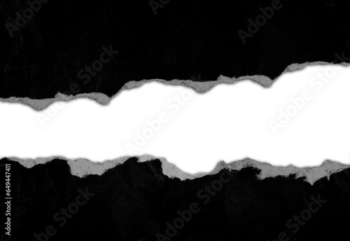 Ripped black paper on white background, space for copy