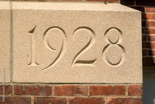 Concrete block, 1928 building cornerstone.