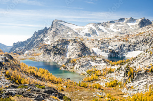 View over golden larches and Perfection Lake in Enchantment Lakes Wilderness in Washington