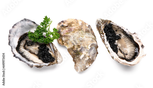 Tasty oysters with black caviar on white background