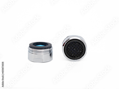 Clean new faucet aerator isolated on white background. Water tap dial for more efficient use of water or water flow regulator.