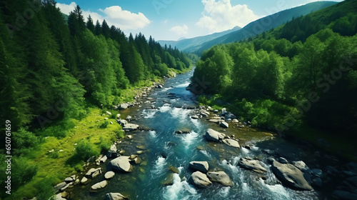 A rocky river in the middle of a forest. Aerial view of river reflecting sky, amid lush green landscape, aerial view. Top view of a mountain river in the forest.