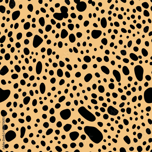 Black spots on beige background, leopard print seamless pattern