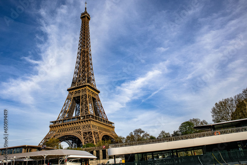 Low angle shot of the world-known Eiffel Tower in Paris, France