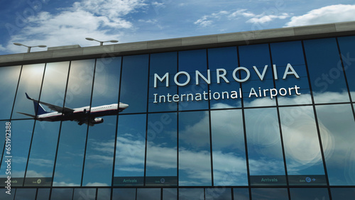 Airplane landing at Monrovia Liberia airport mirrored in terminal