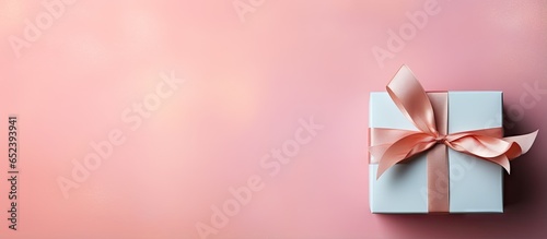 A photographed gift with a bow isolated pastel background Copy space