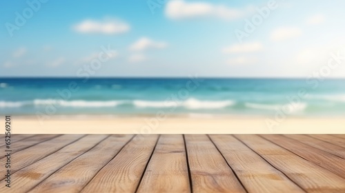 wooden table set against a backdrop of the sea, an island, and a vibrant blue sky.
