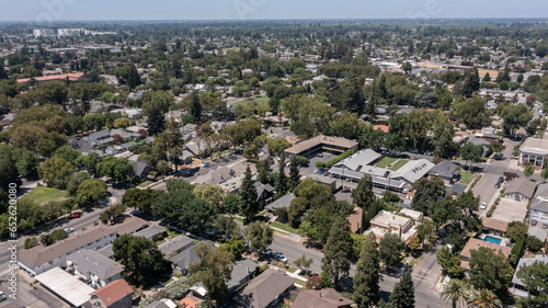 Afternoon light shines on housing adjacent to downtown Lodi, California, USA.