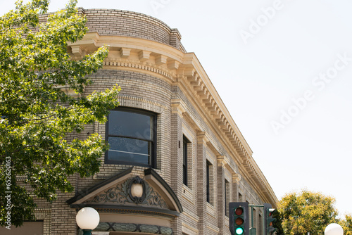 Lodi, California, USA - July 16, 2021: Sunlight shines on the historic downtown buildings of Lodi.
