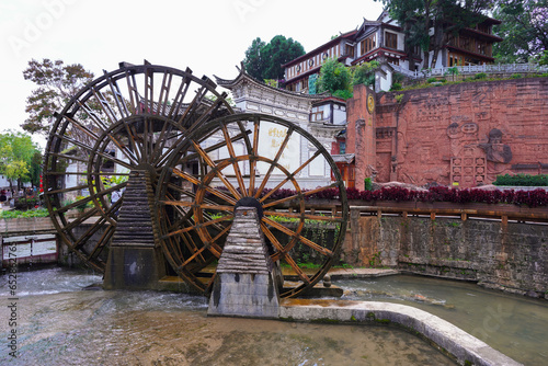 The water wheel in Old Town of Lijiang in Yunnan, China. It is part of UNESCO World Heritage Site - Old Town of Lijiang.