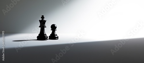 Believe in yourself confident being pawn and king silhouette in chess