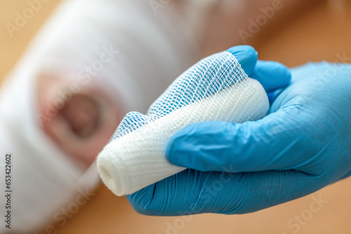 Wound care concept: Symbolizing change of dressing and cleaning and debridement of a wound with a realistic fake wound