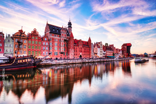 Illuminated Gdansk Old Town with Calm Motlawa River at Sunset, Poland
