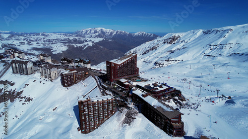 Panoramic view of Ski station centre resort at snowy Andes Mountains near Santiago Chile. Snow mountain landscape. Nevada mountains. Winter travel destination. Winter tourism travel.