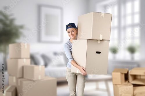 young happy female moving to house