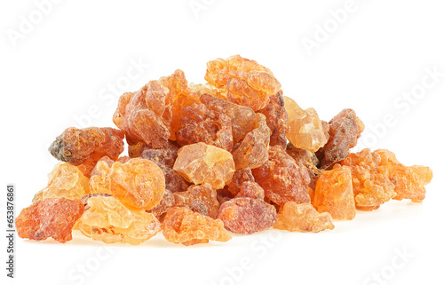 Pile of natural Commiphora myrrha isolated on a white background. Myrrh resin. Sweet Myrrh Opoponax. Incense.