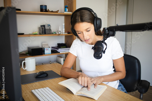 Woman Narrating a Book Recording Session Home Workspace