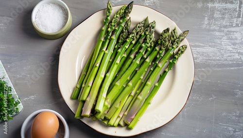 asparagus on a plate, High angle view of a bunch of fresh green asparagus on a plate
