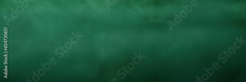 Green Suede background texture, flat and smooth, enhances the luxury of your space, creating a tactile canvas for a sophisticated web banner that elevates visual appeal with its refined surface