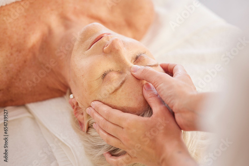 Relax, head massage and senior woman at a spa for luxury, self care and muscle healing treatment. Health, wellness and elderly female person on a retirement retreat for body therapy at natural salon.