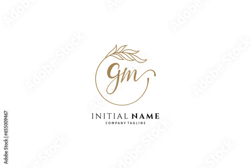 Initial letters G and M, GM, MG, letter logos with circle frames decorated with gold plants, suitable for the fashion, beauty and jewelry industry, wedding invitations