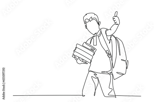 Single continuous line drawing young happy elementary school boy student carrying stack of books and giving thumbs up gesture. Kids education concept. One line draw graphic design vector illustration