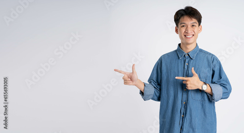 Portrait of Asian male posing on white background