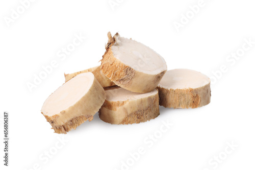Pile of fresh horseradish slices isolated on white