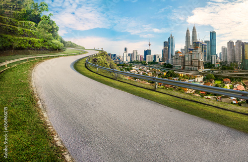 Road in the city, panoramic view of Kuala Lumpur, Malaysia. Morning scene. Logo removed.