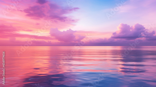 Golden Hour: Stunning Pink Ocean Sunset with Cloudy Sky - Serene Coastal Evening Landscape in the Magic Hour