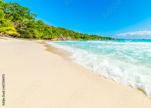 Turquoise water and white sand in Anse Lazio beach