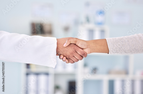 Doctor, people and handshake in partnership, meeting or deal for healthcare agreement at hospital. Closeup of medical worker shaking hands with patient in thank you, welcome or introduction at clinic