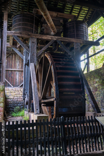 Giant colonial American wooden water wheel vertical