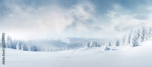 Scenic ultrawide backdrop illustrating the peaceful sight of light snowfall gently falling and settling on the tranquil snowdrifts