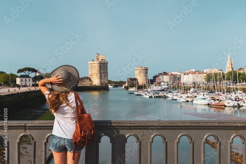 Woman tourist enjoying city landscape of La Rochelle- Charente Maritime in France