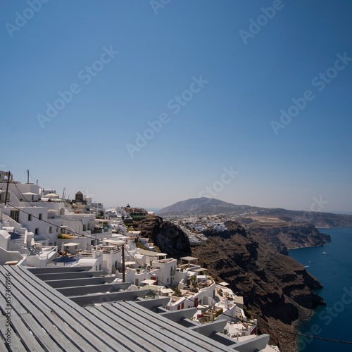 Touristic village landscape on the top of a cliff in Santorini